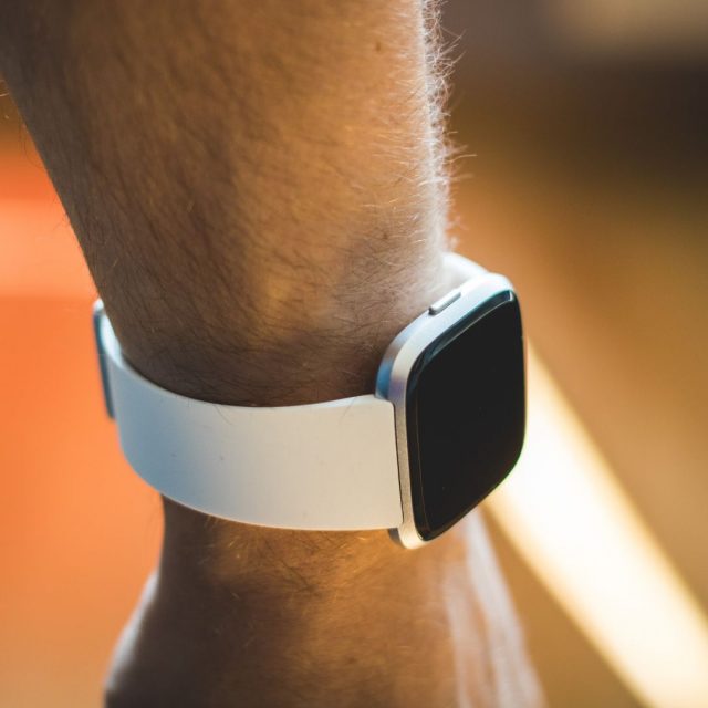 Wrist of a man with an watch exercising